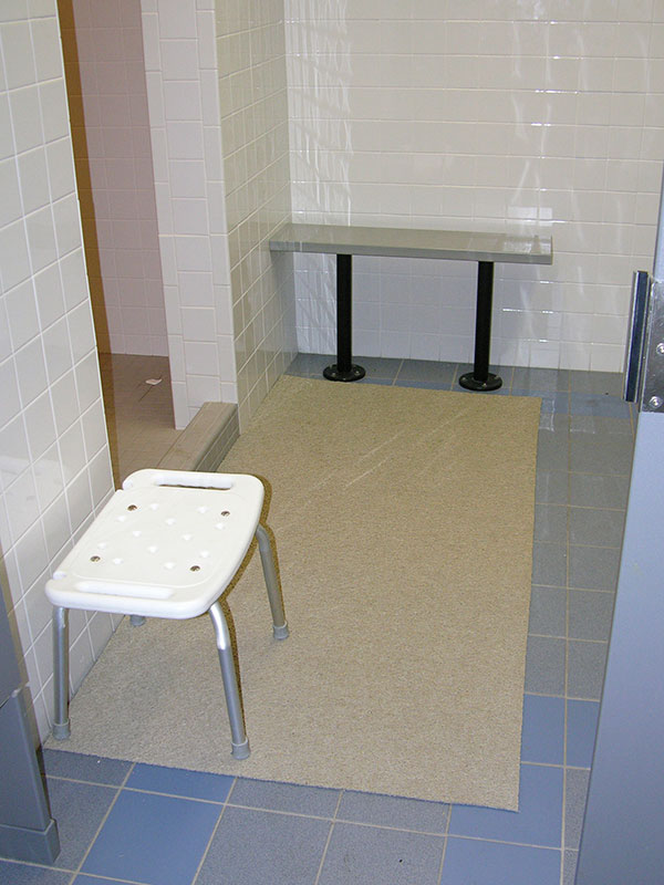 https://www.recreonics.com/wp-content/uploads/2018/07/pem-light-weight-aquatic-matting-used-as-area-mat-in-locker-room-shower.jpg